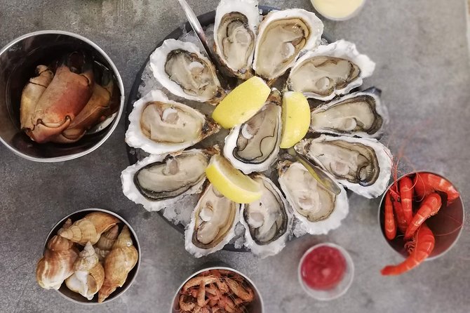 Private French Basque Country Food Tour from San Sebastian - Stop 5: Mercado Les Halles and a serious seafood-and-oyster moment