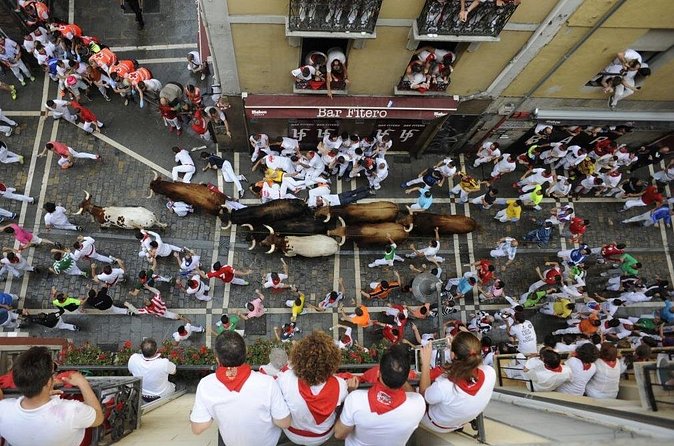 Private Pamplona SAN FERMIN & Bull Run Pick up from San Sebastian - Walking to the Plaza de Toros and the Churros Reset