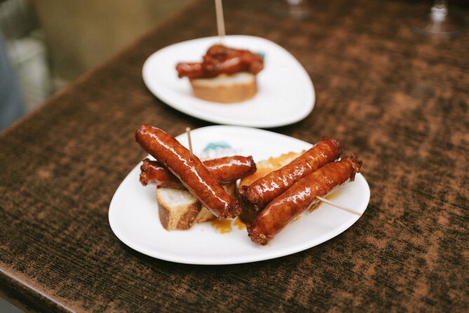 San Sebastian Centro Neighborhood Pintxos & Wine Tour - The 2.5-hour structure: four stops, dinner-sized tastings