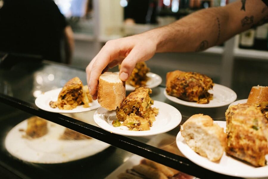 San Sebastian Like a Local: Evening Pintxos Tour - Bar Antonio and Vinos Ezeiza: building from tortilla to wine